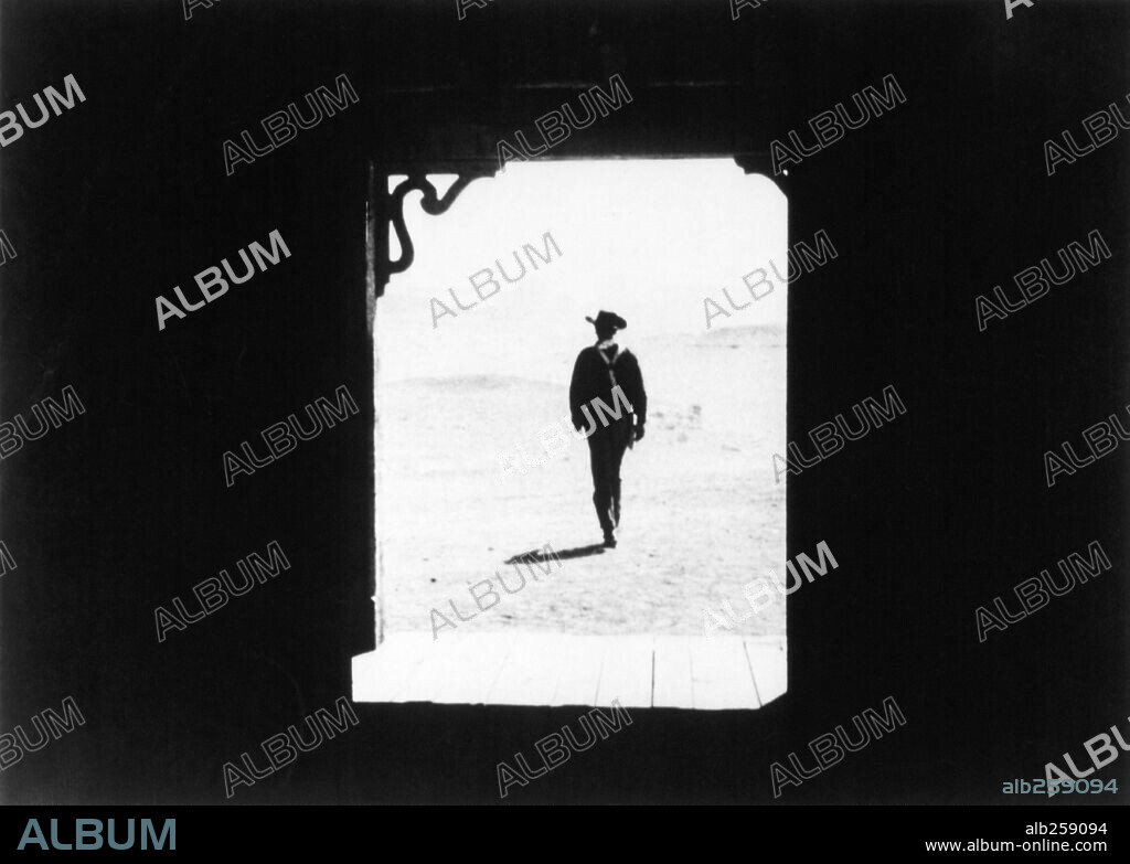 JOHN WAYNE en CENTAUROS DEL DESIERTO, 1956 (THE SEARCHERS), dirigida por JOHN FORD. Copyright WARNER BROTHERS.