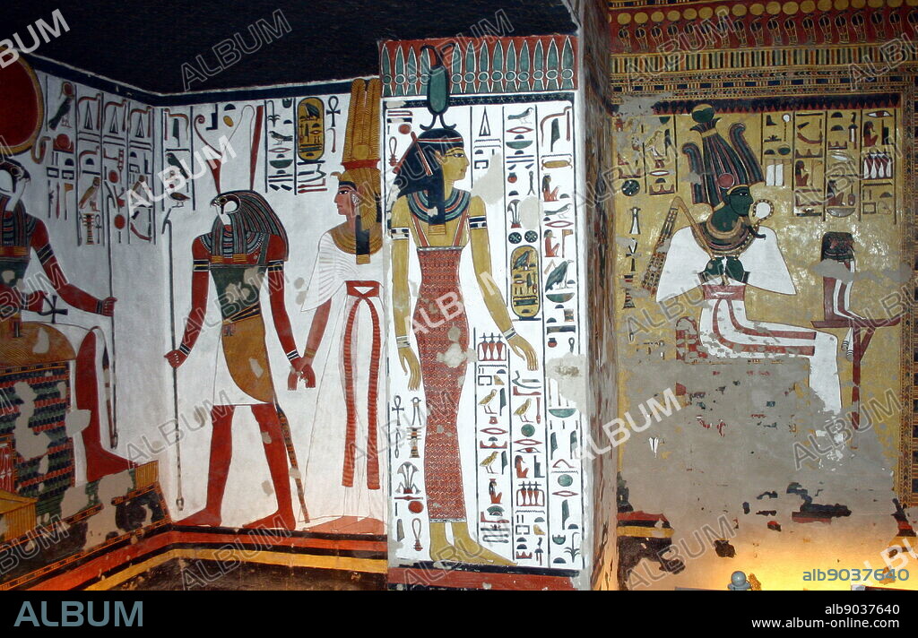 Wall Painting depicting, the God Ra-Harachte, with Nefertari, Great Wife of Pharaoh Ramesses II, Inside the tomb (QV66) of Nefertari, in Egypt's Valley of the Queens. It was discovered by Ernesto Schiaparelli in 1904. It is called the Sistine Chapel of Ancient Egypt. In the Valley of the Queens, Nefertari's tomb once held the mummified body and representative symbolisms of her, like what most Egyptian tombs consisted of. Now, everything had been looted except for two thirds of the 5,200 square feet of wall paintings. ca. 1255 BC.