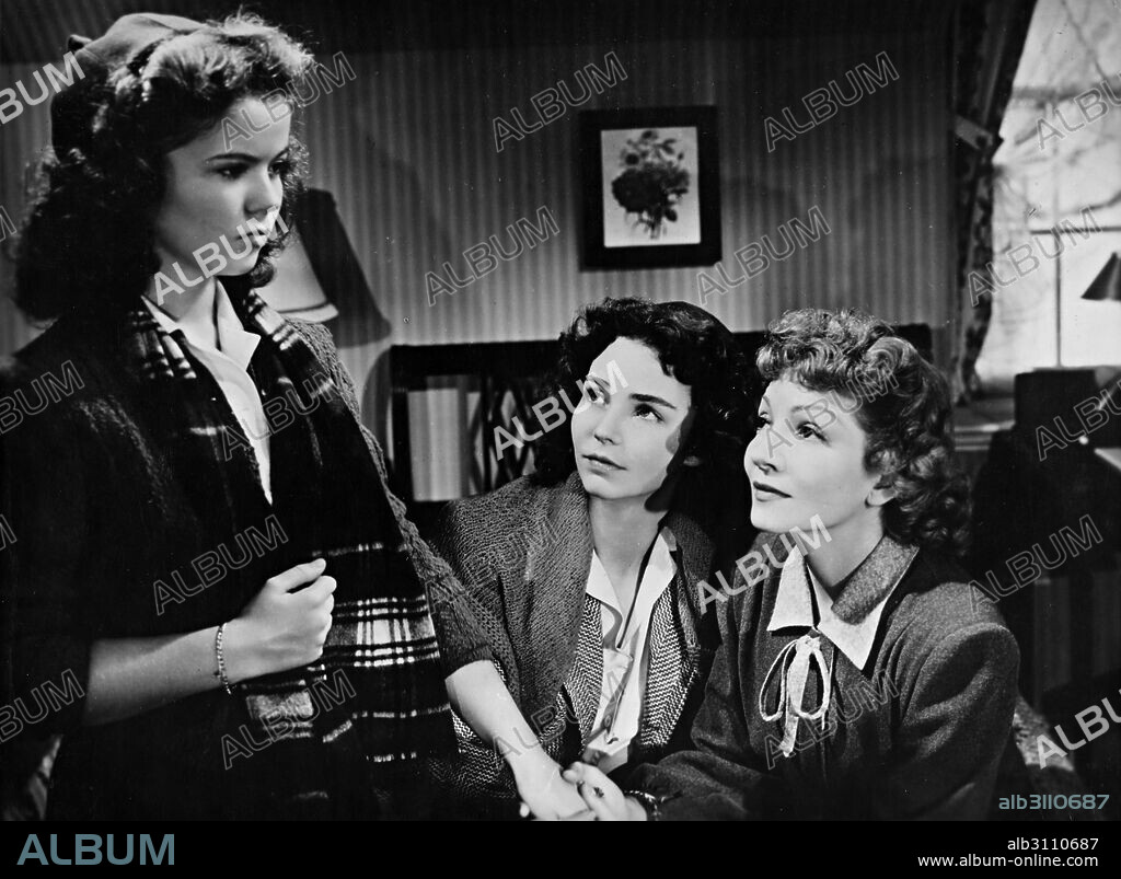 CLAUDETTE COLBERT, JENNIFER JONES and SHIRLEY TEMPLE in SINCE YOU WENT AWAY, 1944, directed by JOHN CROMWELL. Copyright UNITED ARTISTS.