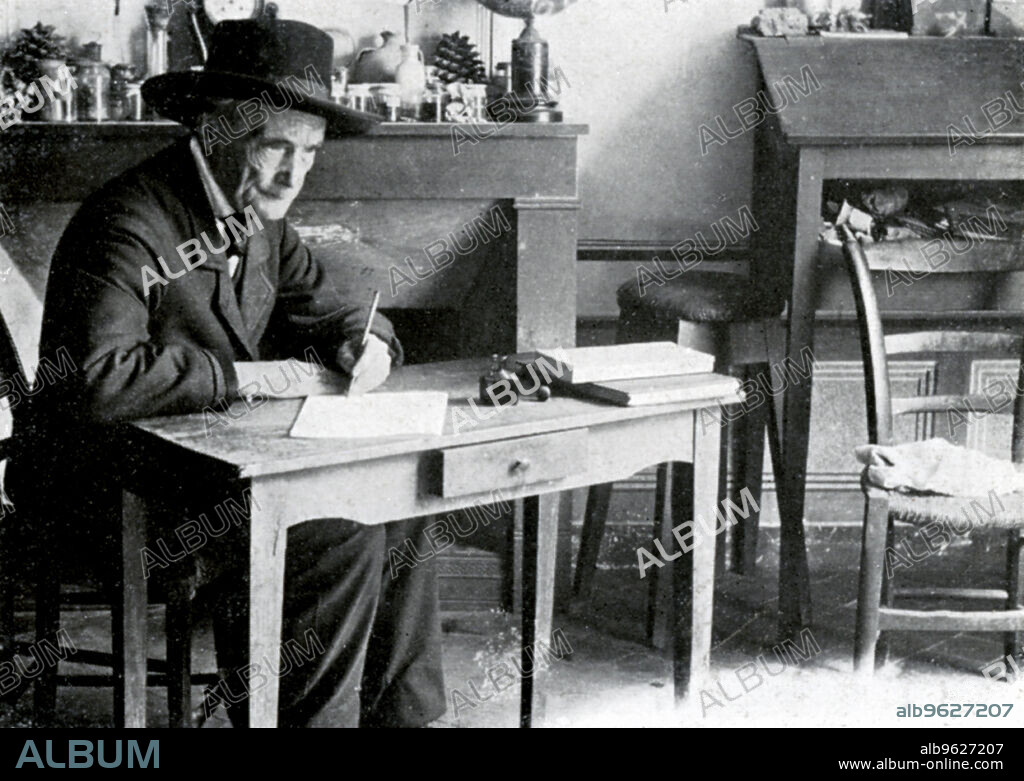 Jean-Henri Fabre, French entomologist, c early 20th century. Fabre (1823-1915), author of numerous books on the anatomy and behaviour of insects, at the little table in his study at Serignan, Vaucluse, France.