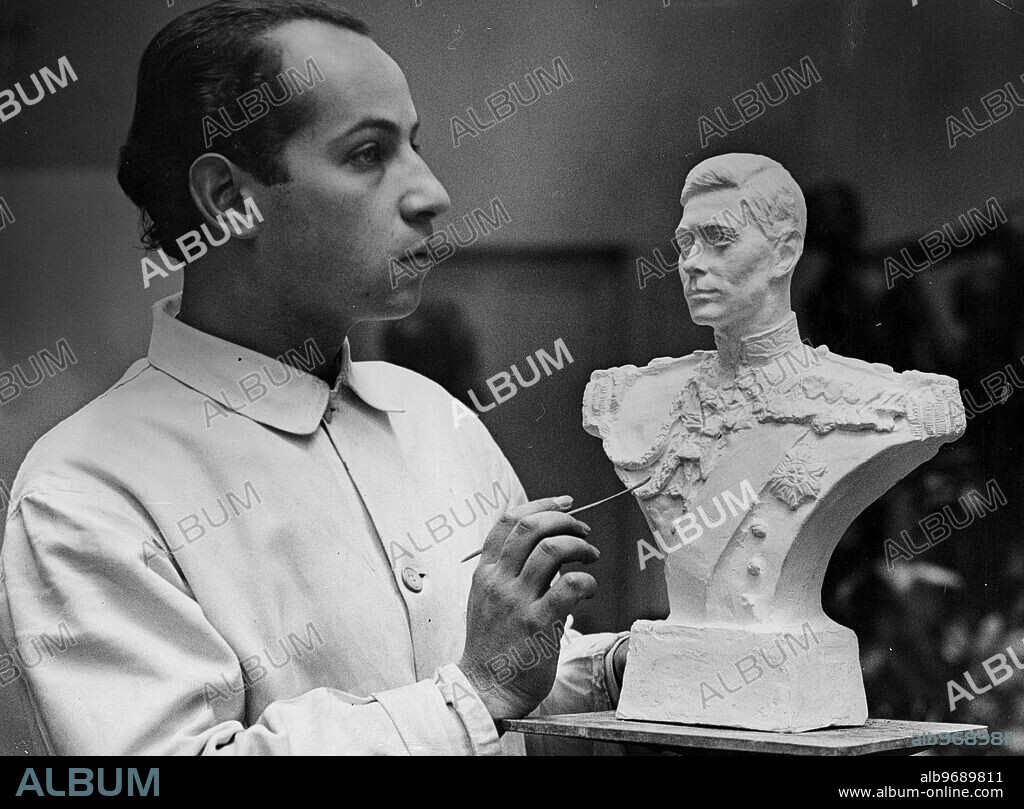 Mr Felix Weiss - Austrian sculptor at work on his bust of King George VI. Mr Weiss' bust of King George V is now in the National portrait Gallery and the same sculptor also did a bust of King Edward VIII , now Duke of Windsor. 8 January 1937.