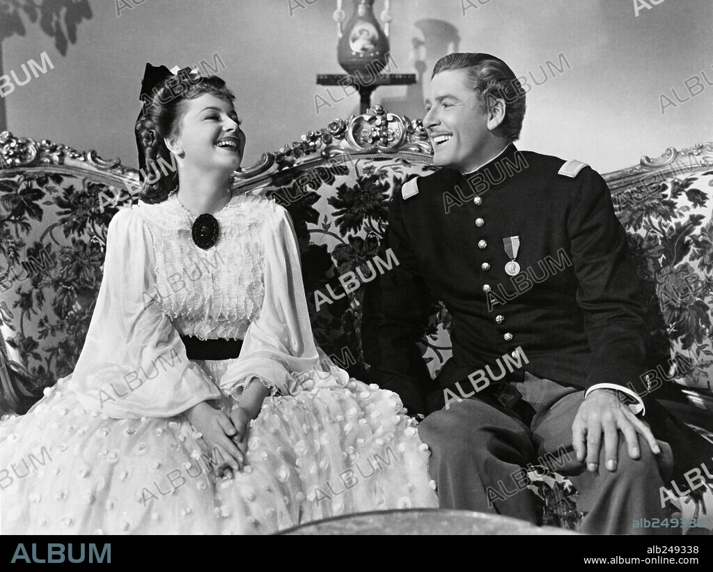 ERROL FLYNN und OLIVIA DE HAVILLAND in THEY DIED WITH THEIR BOOTS ON, 1941, unter der Regie von RAOUL WALSH. Copyright WARNER BROTHERS.
