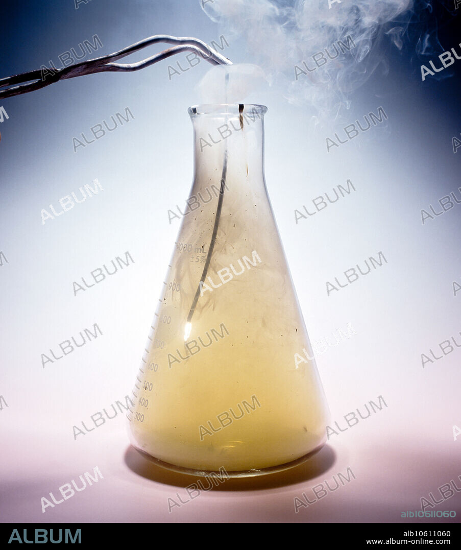 Magnesium is a highly flammable metal, but while it is easy to ignite when powdered or shaved into thin strips, it is difficult to ignite in mass or bulk. Once ignited, it is difficult to extinguish, being able to burn in nitrogen (forming magnesium nitride), carbon dioxide (forming magnesium oxide and carbon) and water (forming magnesium oxide and hydrogen). This property was used in incendiary weapons used in the firebombing of cities in World War II, the only practical civil defence being to smother a burning flare under dry sand to exclude the atmosphere. On burning in air, magnesium produces a brilliant white light which includes strong ultraviolet. Thus magnesium powder (flash powder) was used as a source of illumination in the early days of photography. Later, magnesium ribbon was used in electrically ignited flash bulbs. Magnesium powder is used in the manufacture of fireworks and marine flares where a brilliant white light is required. Flame temperatures of magnesium and.