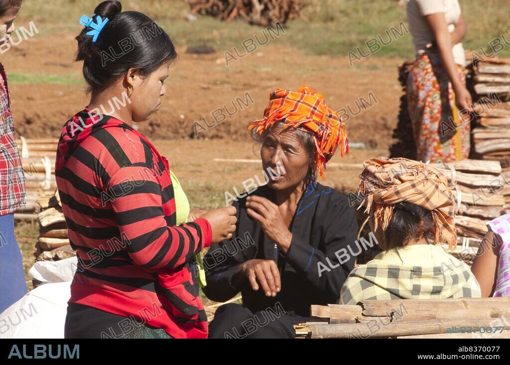 The Pa-O are the seventh largest ethnic nationality in the Republic of the Union of Myanmar. They are the second largest ethnic group in the Shan State, and also live in Kayin State, Kayah State, Mon State and Bago Division. They are believed to be of Tibeto-Burman stock, and are ethnolinguistically related to the Karen.<br/><br/>. Inle Lake is a freshwater lake located in the Nyaungshwe Township of Taunggyi District of Shan State, part of Shan Hills in Myanmar (Burma). It is the second largest lake in Myanmar with an estimated surface area of 44.9 square miles (116 km2), and one of the highest at an altitude of 2,900 feet (880 m).<br/><br/>. The people of Inle Lake (called Intha), some 70,000 of them, live in four cities bordering the lake, in numerous small villages along the lake's shores, and on the lake itself. The entire lake area is in Nyaung Shwe township. The population consists predominantly of Intha, with a mix of other Shan, Taungyo, Pa-O (Taungthu), Danu, Kayah, Danaw and Bamar ethnicities. Most are devout Buddhists, and live in simple houses of wood and woven bamboo on stilts; they are largely self-sufficient farmers.