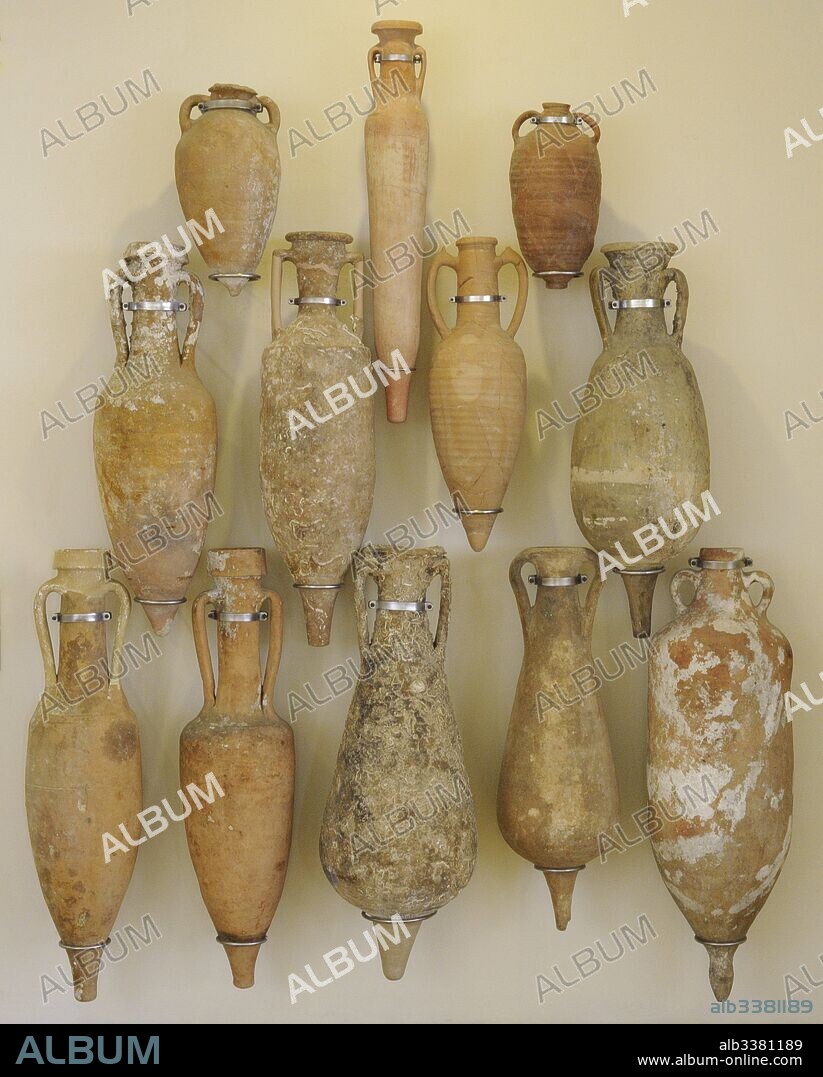 Starting from the upper left. Amphora. 3rd C.E. Transport of Oil. Baetica. Amphora 5th-6th C.E. Transport wine and  other products. Amphora. 5th-4th C.E. Transport wine. Altafulla. Amphora Italica. 2nd B.C.E. Transport wine. Amphora. 1st-2nd C.E. Transport wine. From Bera. Amphora Rhodes. 1st century C.E. Transport wine. Amphora. 1st-2nd C.E. Transport wine or salting fish. Tarragona. Amphora Italica. 1st B.C.E. Transport wine. Amphora. 1st century B.C.E. Transport wine. From Majorca. Piriform amphora. 1st C.E. Transport salting fish. Amphora. 1st-2nd C.E. Transport salting fish. Amphora. 3rd century. Transport oil, salting fish and  olives of North Africa area. Balearic Islands. National Archaeological Museum. Tarragona. Spain.