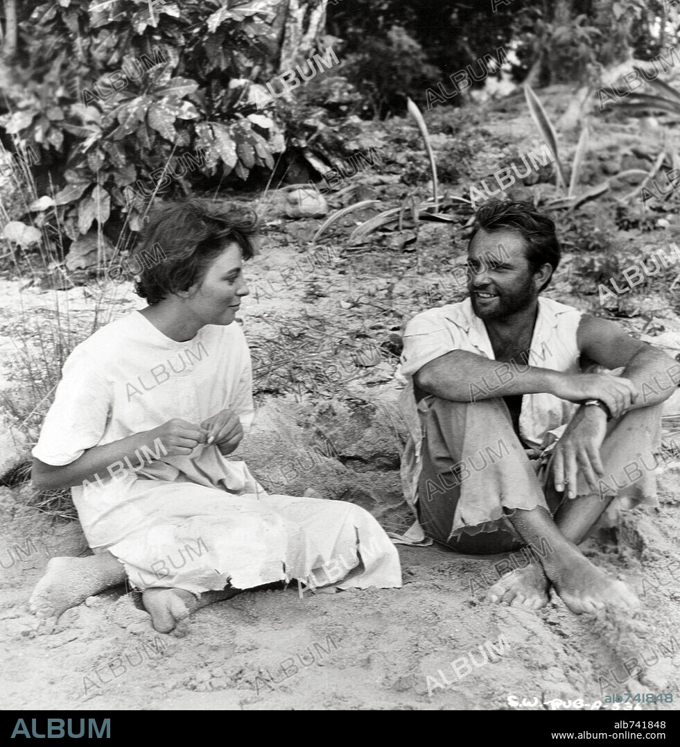 JOAN COLLINS et RICHARD BURTON dans SEA WIFE, 1957, réalisé par BOB MCNAUGHT. Copyright 20TH CENTURY FOX.
