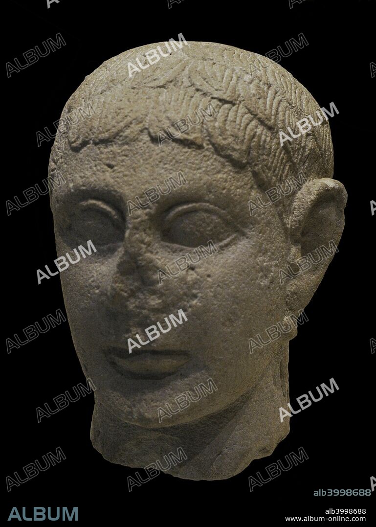 Male head. 1st century BC. Limestone. Iberian culture. From the Shrine of Cerro de los Santos (Montealegre del Castillo, Albacete province, Castile-La Mancha, Spain). National Archaeological Museum. Madrid. Spain.