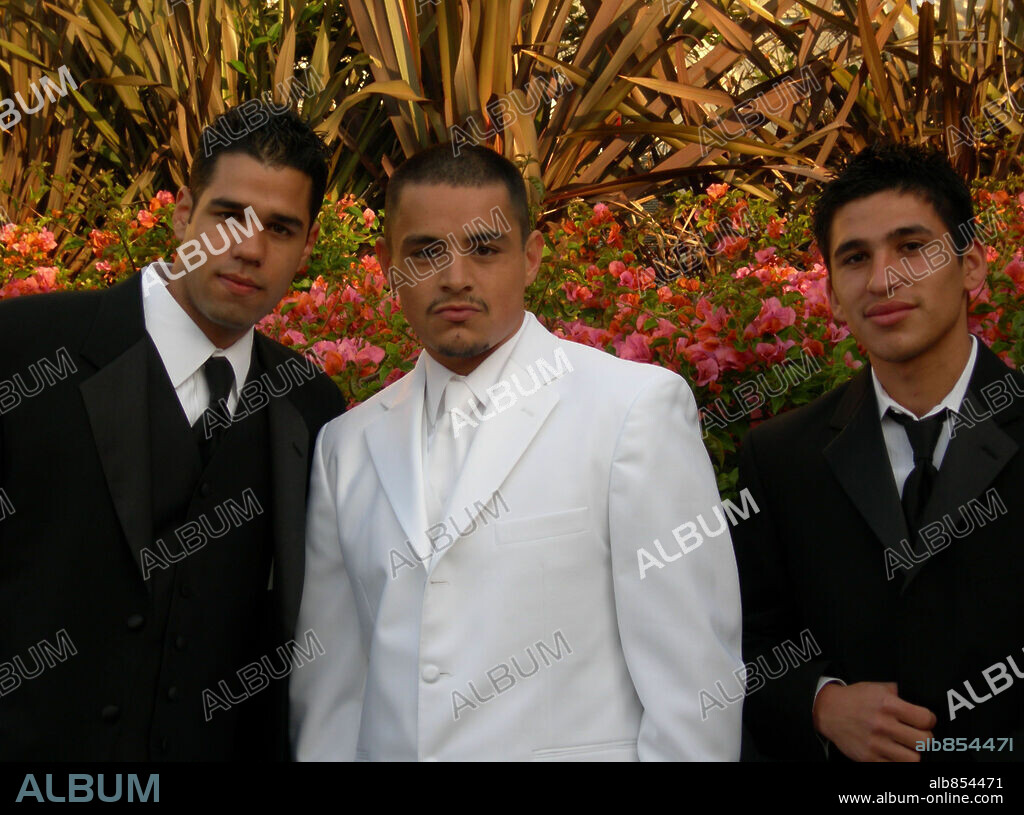 HECTOR QUEVEDO, J. R CRUZ and JESSE GARCIA in QUINCEAÑERA, 2006, directed by RICHARD GLATZER and WASH WEST. Copyright CINETIC MEDIA/KITCHEN SINK ENTERTAINMENT LLC.