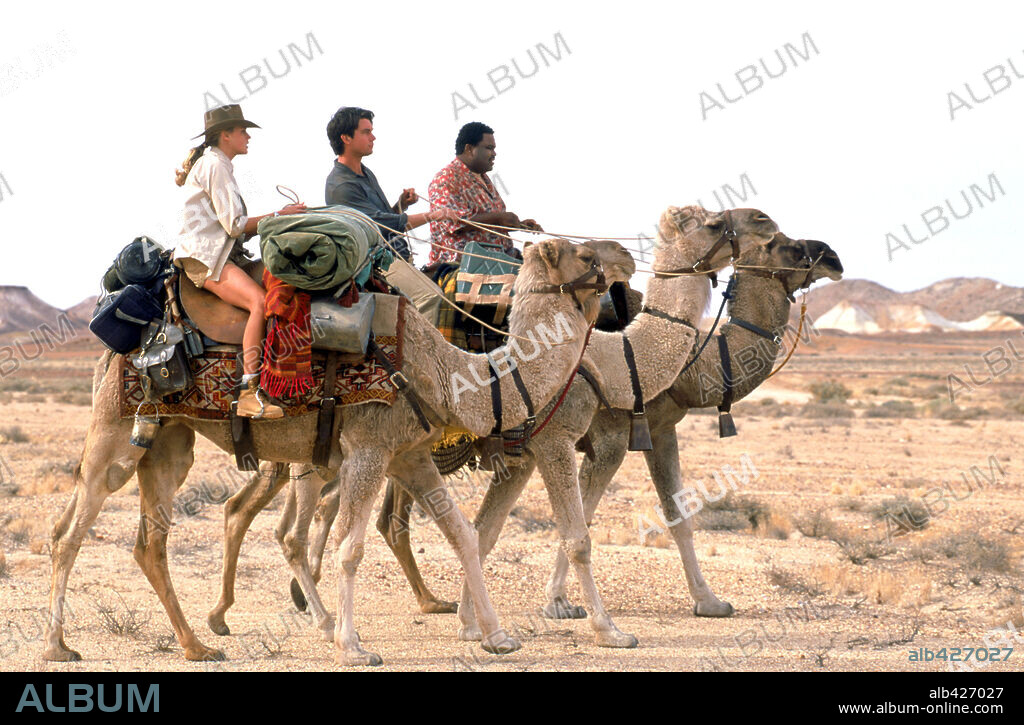 ANTHONY ANDERSON, ESTELLA WARREN and JERRY O'CONNELL in KANGAROO JACK, 2003, directed by DAVID MCNALLY. Copyright WARNER BROS. PICTURES.