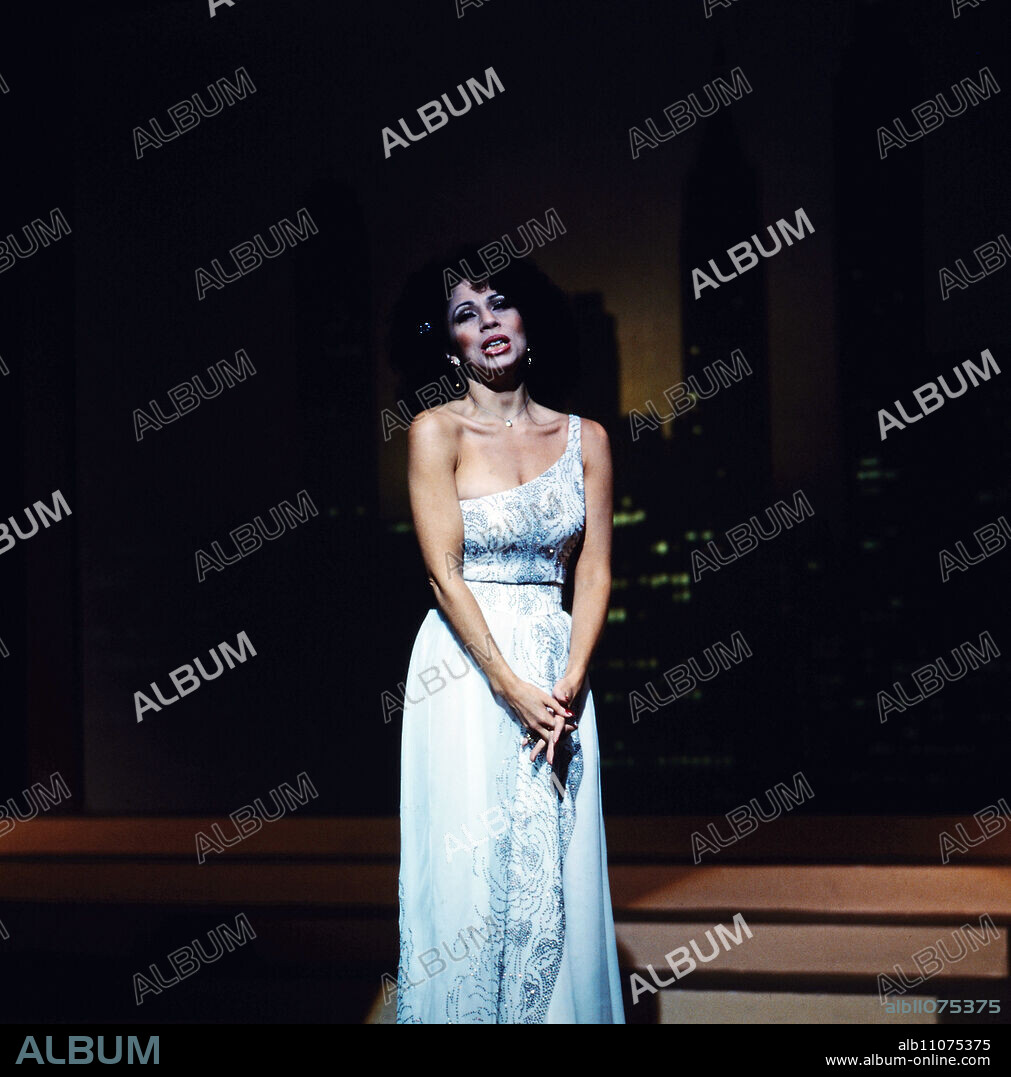 Julia Migenes, American opera singer and actress, here at a performance, Germany, 1982.