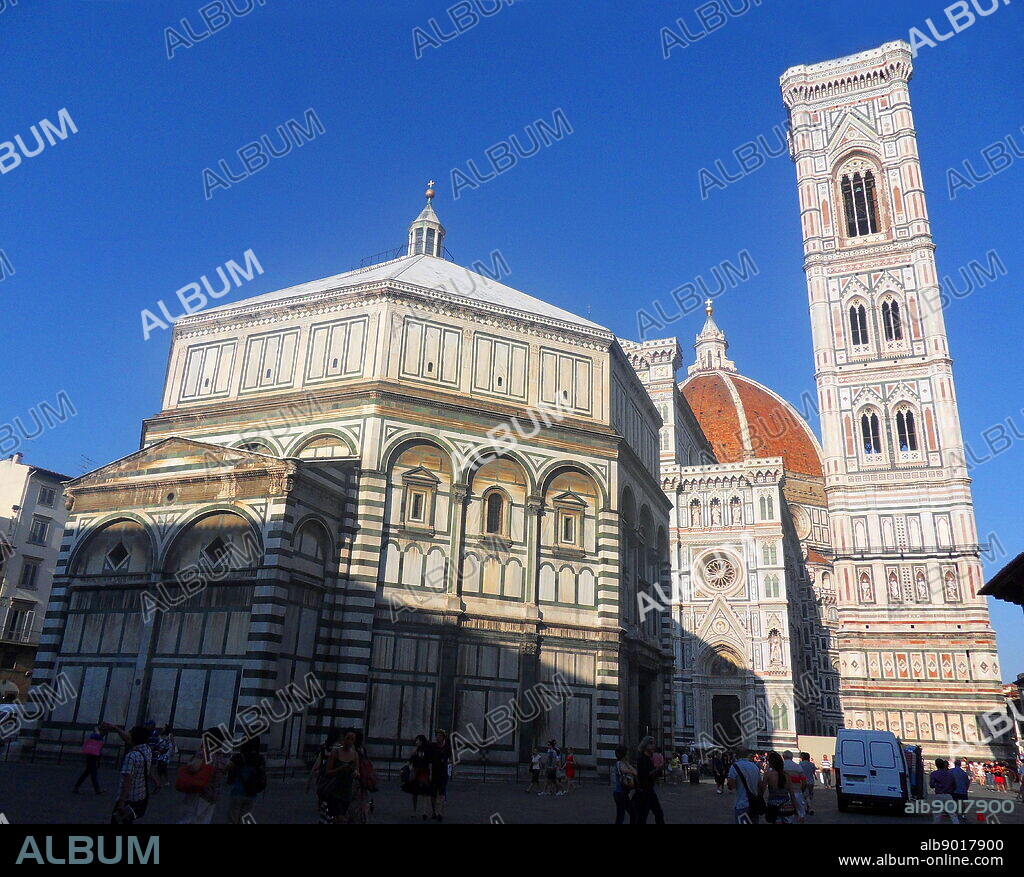 The Battistero di San Giovanni (Florence Baptistery) is considered a minor basilica, and is a religious building in Florence, Italy. It is in the Florentine Romanesque style, and was built between 1059 and 1128, making it one of the oldest buildings in the city. 3 sets of bronze doors with relief sculptures are on the exterior. The south doors created by Andrea Pisano, and the east and north doors by Lorenzo Ghiberti.