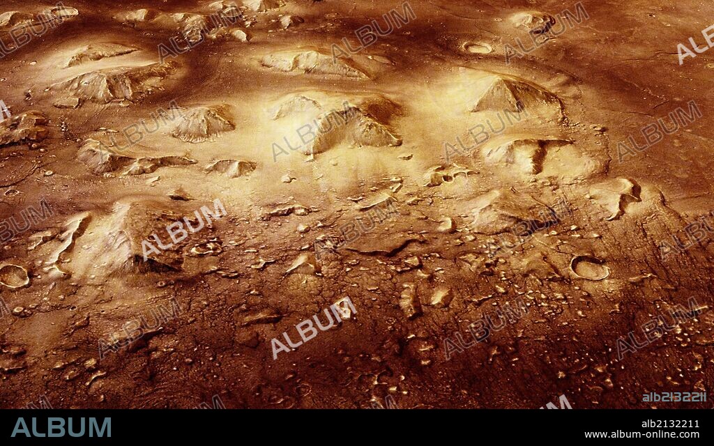 The unusual stone mesas of the Cydonia region on Mars are quite striking in appearance. This mesa, when lit from just the right sun angle, can appear similar to a human face and became famous as the Face on Mars in 1976 Viking orbiter images. (Photo by: Universal History Archive/UIG via Getty Images).
