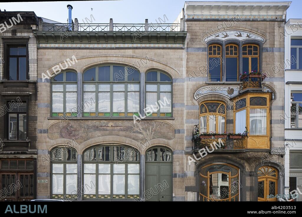 Maison-Atelier Louise de Hem, 15-17 Rue Darwin, Brussels, c2014-c2017. Designed by Ernest Blerot: 1902-5 for the painter Louise De Hem. Stone facade with bay window and workshop with sgraffito of the arts.