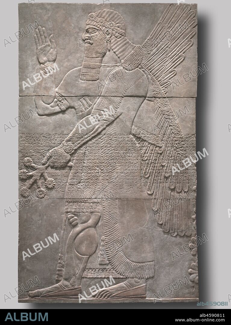 Saluting Protective Spirit, 883-859 BC. Assyrian kings ruled the world's largest empire prior to the rise of Persia in the 6th century bc, consolidating lands from Iran to Egypt. In 879 bc the Assyrian king Ashurnasirpal II began building his new royal residence at Nimrud. Originally brightly painted, this is one of some 300 reliefs that decorated the palace. Masterfully executed with incised details and exaggerated musculature, this giant, fierce, protective spirit raises his right hand in a ritual salute. His left hand grasps a branch bearing rosettes, perhaps a stylized date palm. Across the center of the relief are inscribed lines of Akkadian cuneiform recounting military victories, conquests, plundered loot, and the reconstruction of the city. Destroyed in 612 bc, the palace lay buried for 24 centuries until rediscovered in 1845.