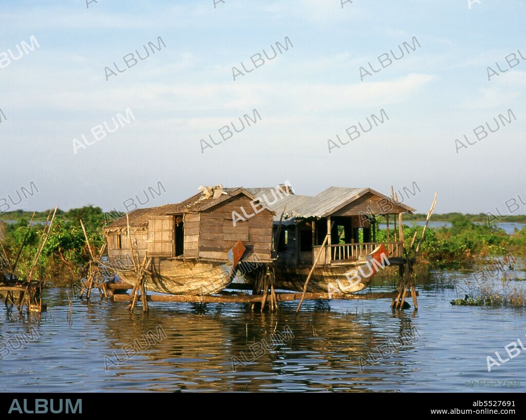 The Tonlé Sap (Large Fresh Water River or Great Lake) is a combined lake and river system of major importance to Cambodia. The Tonlé Sap is the largest freshwater lake in South East Asia and is an ecological hot spot that was designated as a UNESCO biosphere in 1997. The Tonlé Sap is unusual for two reasons: its flow changes direction twice a year, and the portion that forms the lake expands and shrinks dramatically with the seasons. From November to May, Cambodia's dry season, the Tonlé Sap drains into the Mekong River at Phnom Penh. However, when the year's heavy rains begin in June, the Tonlé Sap backs up to form an enormous lake. The Tonlé Sap is home to many ethnic Vietnamese and Cham communities, living in floating villages around the lake.