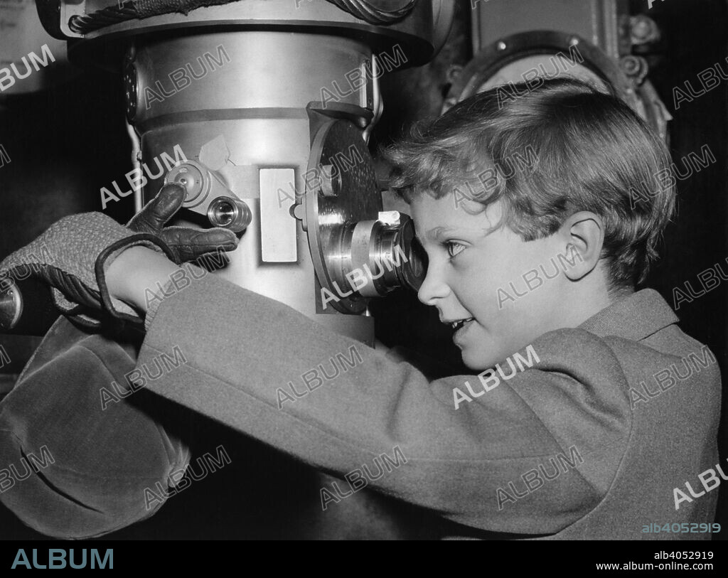 Crown Prince Carl Gustaf of Sweden on a submarine at an exhibition, Stockholm, Sweden, 1956. The son of of Prince Gustaf Adolf, Duke of Västerbotten and Princess Sibylla of Saxe-Coburg and Gotha, Carl XVI Gustaf (1946-) became King of Sweden in 1973.