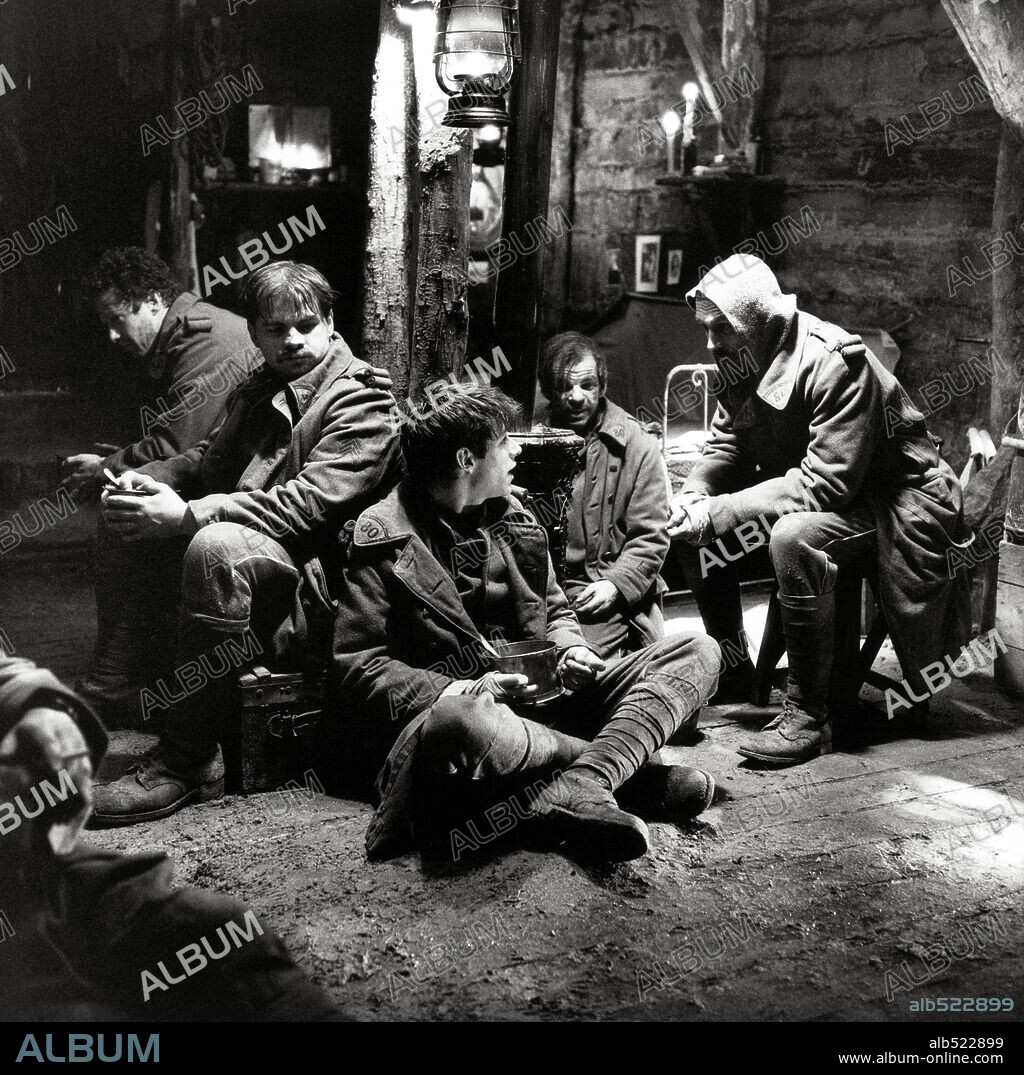CLOVIS CORNILLAC, DENIS LAVANT, DOMINIQUE BETTENFELD, GASPARD ULLIEL, JEAN-PIERRE BECKER and JEROME KIRCHER in A VERY LONG ENGAGEMENT, 2004 (UN LONG DIMANCHE DE FIANÇAILLES), directed by JEAN-PIERRE JEUNET. Copyright WARNER BROS. / CALVO, BRUNO.