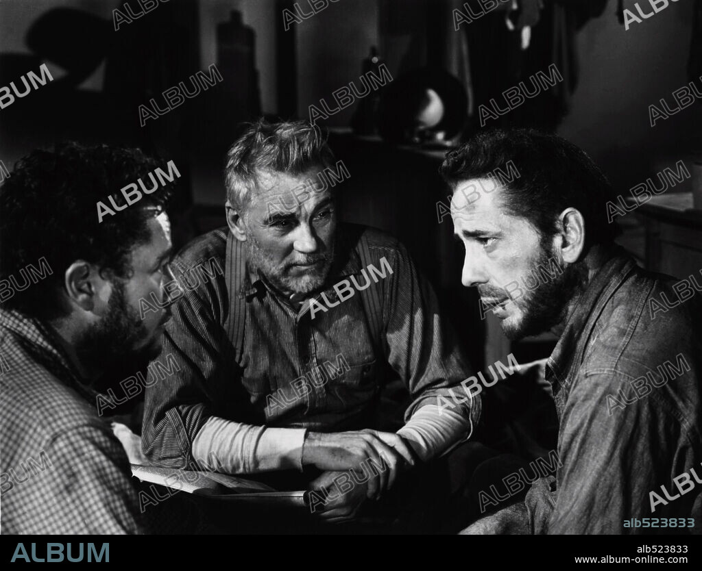 HUMPHREY BOGART, TIM HOLT and WALTER HUSTON in THE TREASURE OF THE SIERRA MADRE, 1948, directed by JOHN HUSTON. Copyright WARNER BROTHERS.