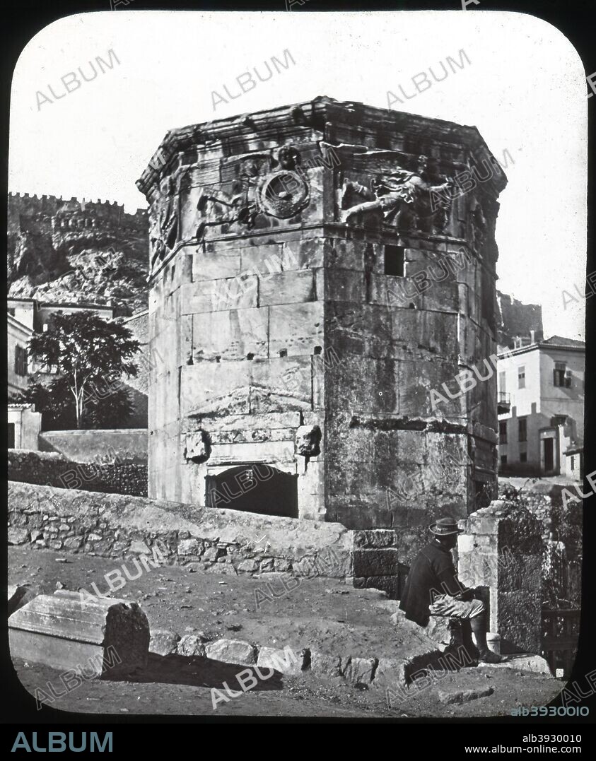 Tower of the Winds, Athens, Greece, late 19th or early 20th century. The Tower of the Winds is an octagonal tower dating from Roman times. It was originally used as a means of telling the time, housing a water clock and being surrounded by nine sundials. The building was used as the bell tower of a Byzantine Church in early Christian times. Lantern slide.