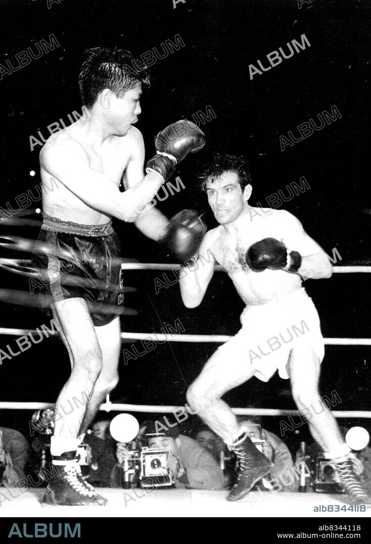 Argentine flyweight Pascual Perez (right) won the World Title on November 26th after beating Yoshio Shirai on points. Perez began with a whirlwind attack and never let up. December 22, 1954.