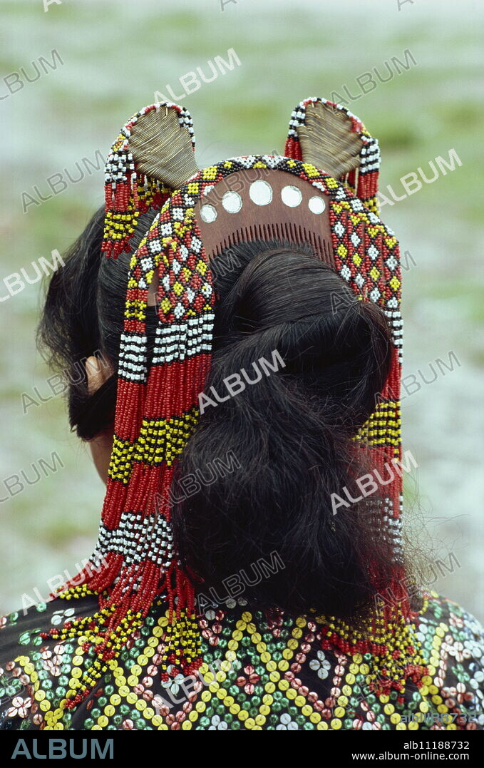 Close-up of head-dress of comb and beads of a woman of the T'boli tribe in southern Mindanao, Philippines, Southeast Asia, Asia.