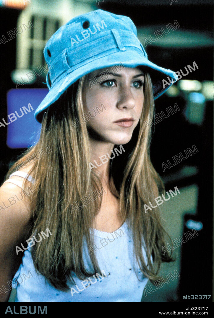 JENNIFER ANISTON en TRABAJO BASURA, 1999 (OFFICE SPACE), dirigida por MIKE JUDGE. Copyright 20TH CENTURY FOX / REDIN, VAN.