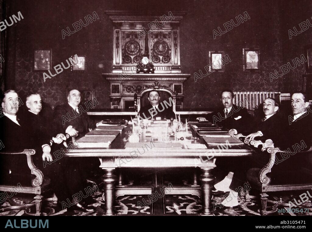 The new Spanish government meets under Dámaso Berenguer y Fusté (1873 – 1953) Spanish soldier and politician. From January 1919 to July 1922 he was the High Commissioner of Spanish Morocco. After planning an uprising, however, he was court-martialled and discharged from the service. He was saved, however, by 13 September 1923 coup d'état of Miguel Primo de Rivera. He was granted an amnesty and appointed military chief of the royal household. In January 1930, following the forced resignation of the dictator Primo de Rivera, King Alfonso XIII ordered Berenguer to form a government and restore a degree of normality to the country. As prime minister, Berenguer repealed some of the harsher measures introduced by Primo de Rivera.