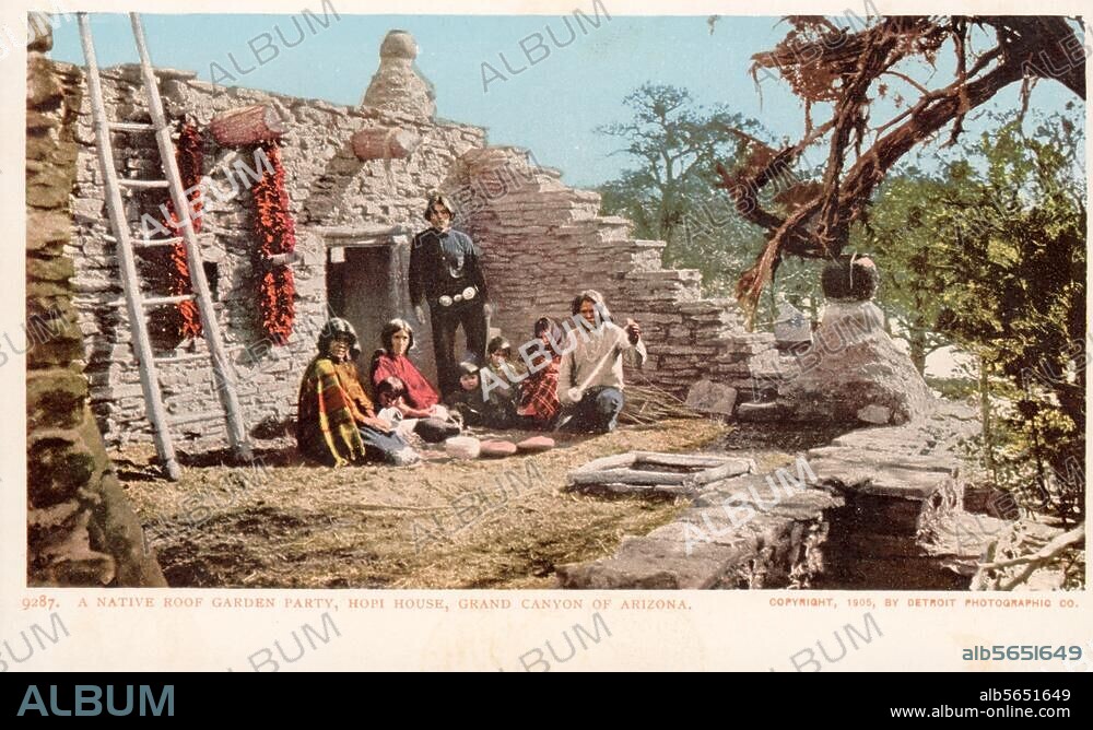 Ethnology / America. Hopi- (Moqui-) Indian: on the roof of a house in a Pueblos in the Grand Canyon (Arizona). Photo, coloured, c. 1905.