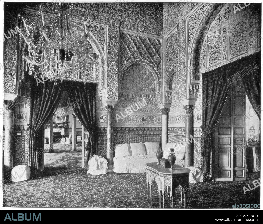 Salon of Maria de Padilla, Alcazar, Seville, Spain, late 19th century. The Alcazar was built over Moorish ruins during the 14th century for King Pedro of Castile. Moorish workers gave it a distinctly Islamic design. Maria de Padilla was Pedro's mistress and later his wife. Photograph from Portfolio of Photographs, of Famous Scenes, Cities and Paintings by John L Stoddard, published by the Werner Company, (Chicago, c1899).