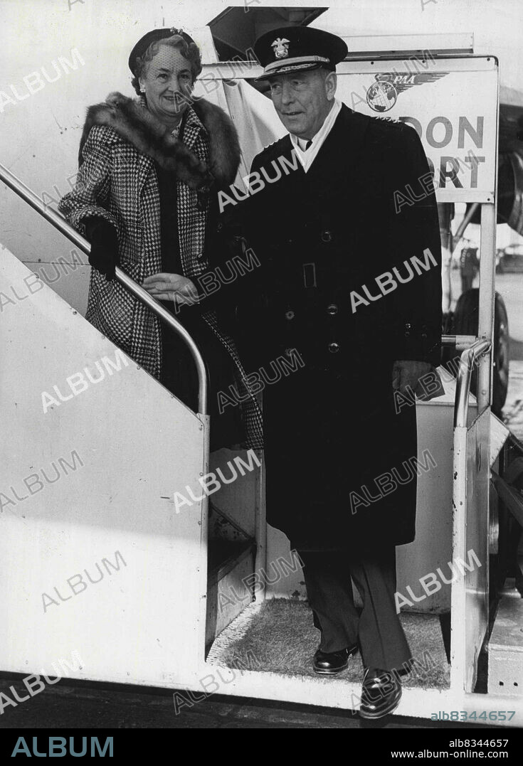 United States Admiral In Britain For Talks -- Admiral Arthur W. Radford, chairman of the United States Chiefs of Staff, arrives at London Airport today, with his wife from Oslo. He has been visiting North Atlantic Treaty Organisation bases in Europe. Talks with top Services commanders and a visit to the U.S. Air Force base at Ruislip, Middlesex, are planned for him in Britain during his four day visit. Next week the Admiral flies on to Madrid. November 06, 1953. (Photo by Evening Standard Picture).