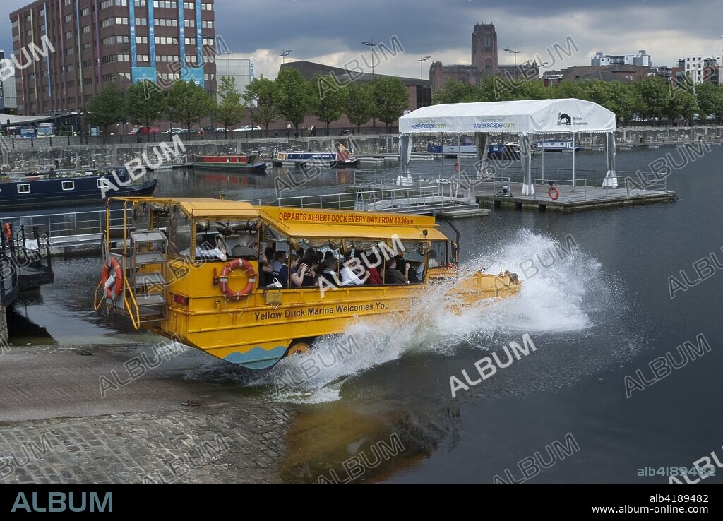 The Yellow Duckmarine, an amphibious tour vehicle touring the docks, Liverpool, Merseyside, England.