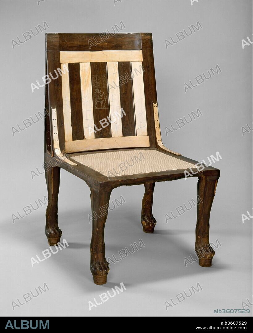 Chair of Reniseneb. Dimensions: h. 86.2 cm (33 15/16 in). Dynasty: Dynasty 18. Date: ca. 1450 B.C..
The back of this wooden chair, which belonged to the scribe Reniseneb, is handsomely veneered with ivory and embellished with incised decoration showing the owner seated on a chair of identical form. It is the earliest surviving chair with such a representation, and it is the only non-royal example known. The scene and accompanying text have funerary import and may have been added following Renyseneb's death to make the chair a more suitable funerary object. The high quality of its joinery and the harmony of its proportions testify to the skill of ancient Egyptian carpenters. The mesh seat has been restored following ancient models.