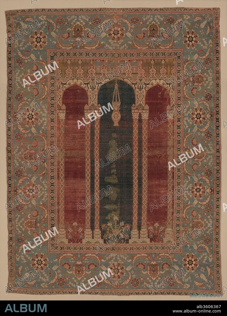 Carpet with Triple-Arch Design. Dimensions: Rug: L. 68 in. (172.7 cm)
 W. 50 in. (127 cm)
Mount: L. 71 in. (180.3 cm)
 W. 53 3/4 in. (136.5 cm) 
D. 3 5/8 in. (9.2 cm)
 Wt. 120 lbs. (54.4 kg). Date: ca. 1575-90.
This carefully drawn, subtly colored carpet is among the finest of all Ottoman weavings. One of the earliest carpets to include a triple-arched gateway, its design probably originated in the Ottoman imperial workshop. The hanging lamp in the center arch recalls verses from the Qur'an that liken God to the light of a lamp, placed within a niche. The combination of this carpet's imagery, high quality, and relatively small size suggest that it was used as a prayer rug by a member of the Ottoman courtly elite.