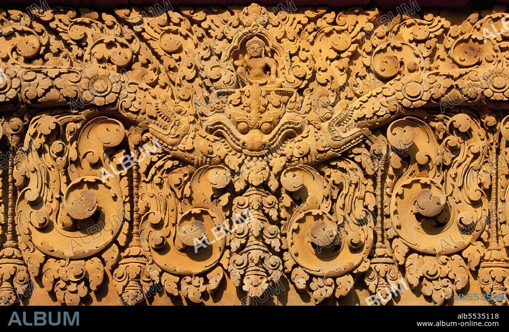 Banteay Srei (or Banteay Srey) is a 10th century Cambodian temple dedicated to the Hindu god Shiva and is located to the north-east of the main group of temples at Angkor. Banteay Srei is built largely of red sandstone, a medium that lends itself to the elaborate decorative wall carvings which are still observable today. Banteay Srei is sometimes referred to as the 'jewel of Khmer art.'.