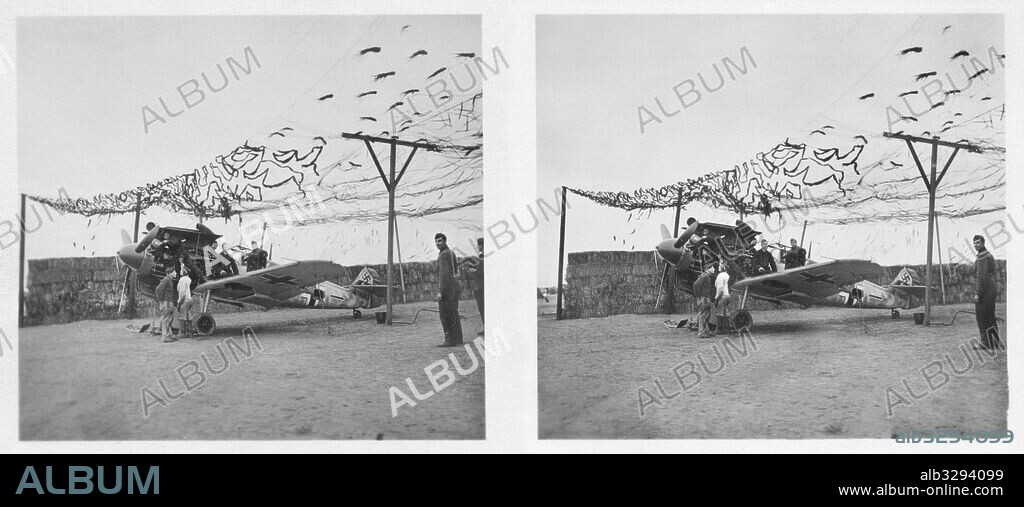 German ground crew overhaul a Me-109.