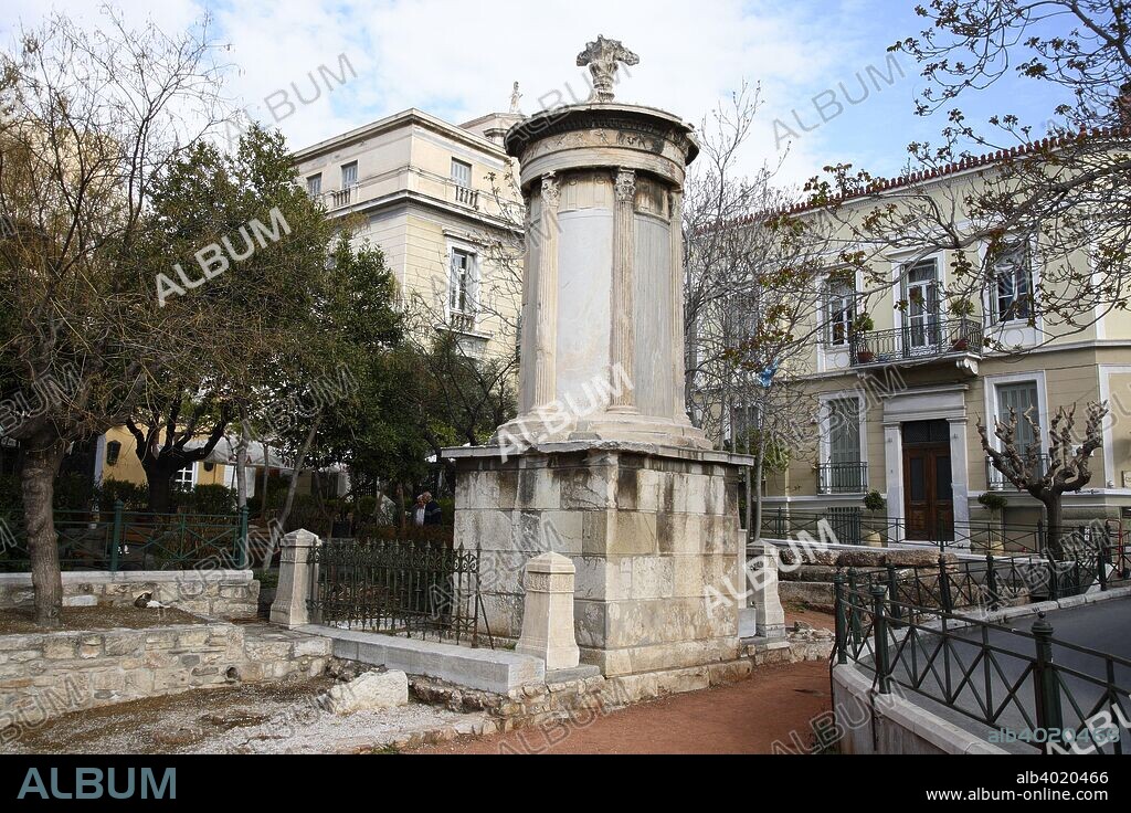 The Monument of Lysicrates, Athens, Greece. The Choragic Monument of Lysicrates near the Acropolis of Athens was erected by the choregos Lysicrates, a patron of many theatrical performances in the Theater of Dionysus, to commemorate the award of first prize in 335 BC or 334 BC, to one of the performances he had sponsored. The choregos was the sponsor who paid for and supervised the training of the dramatic dance-chorus.