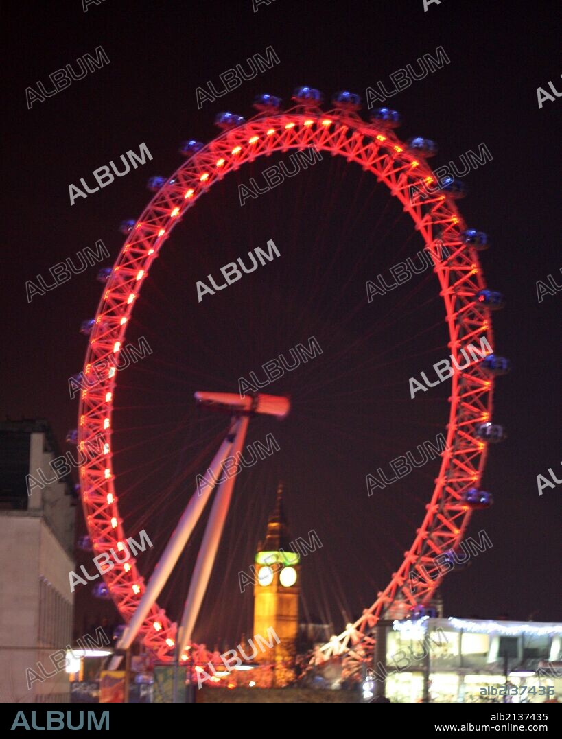 The London Eye' a giant Ferris wheel in London, England. Situated on the banks of the River Thames. Designed by architects Frank Anatole, Mark Sparrow hawk, Nic Bailey, Malcolm Cook, Steve Chilton, Julia Barfield and David Marks. Erected in 1999. In the background you can see Big Ben. (Photo by: Universal History Archive/UIG via Getty Images).