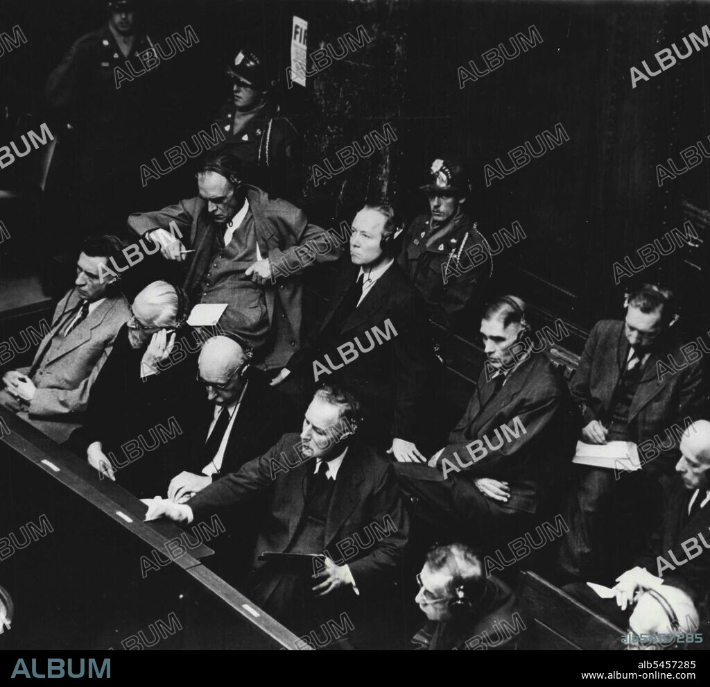 Nazi war chiefs face trial at Nuremberg -- Front row (Left to Right) Carl Krauch, Hermann Schmitz, Georg Von Schintzler, Fritz Gauewski, Hefrich Hoerlein, August Von Knieriem. Second row (Left to Right) Paul Haefliger, Max Ilgner, Friedrich Jaehne, Hans Kuehne and Carl Lautenschalecer. They are seen in the Nuremberg courtroom during the opening session of the trial on August 27.Twenty two leading officials of I.G. Farben, the German chemical cartel, are now on trial in the same courtroom at Nuremberg, Germany, where Goering and his associates were sentenced. September 7, 1947. (Photo by Associated Press Photo).