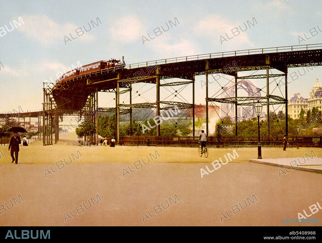 The Ninth Avenue El (Elevated) at 110th Street, New York City, c. 1900. The IRT Ninth Avenue Line was the first elevated railway in New York City. It opened on July 3, 1868 and ceased operation on June 11, 1940. This curve from 110th Street to Eighth Avenue was the highest ever built at 100 feet (30 m) above the street and made a 90-degree turn from Ninth Ave on to 110th Street, then another on to Eighth Avenue. It was dubbed "Suicide Curve" as some people leapt to their death from this location.