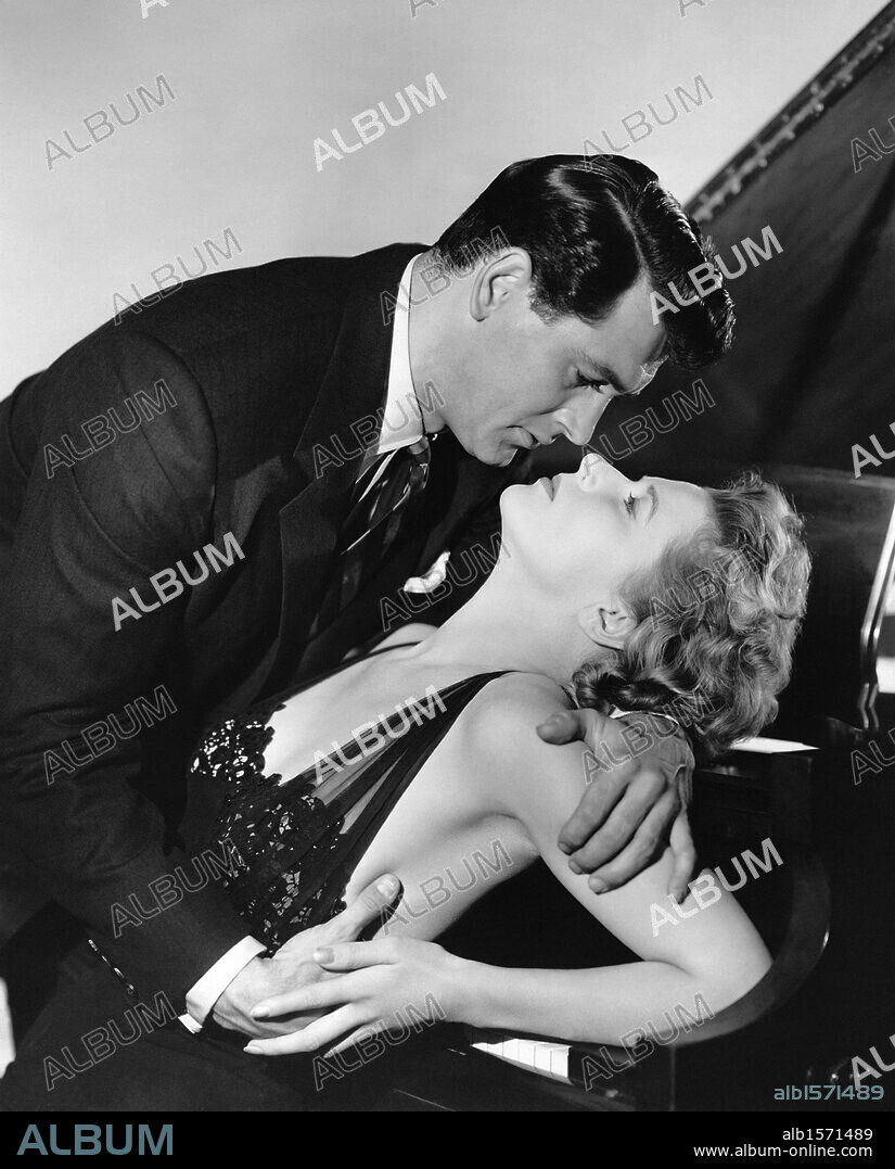 CORNELL BORCHERS and ROCK HUDSON in NEVER SAY GOODBYE, 1956, directed by JERRY HOPPER. Copyright UNIVERSAL PICTURES.