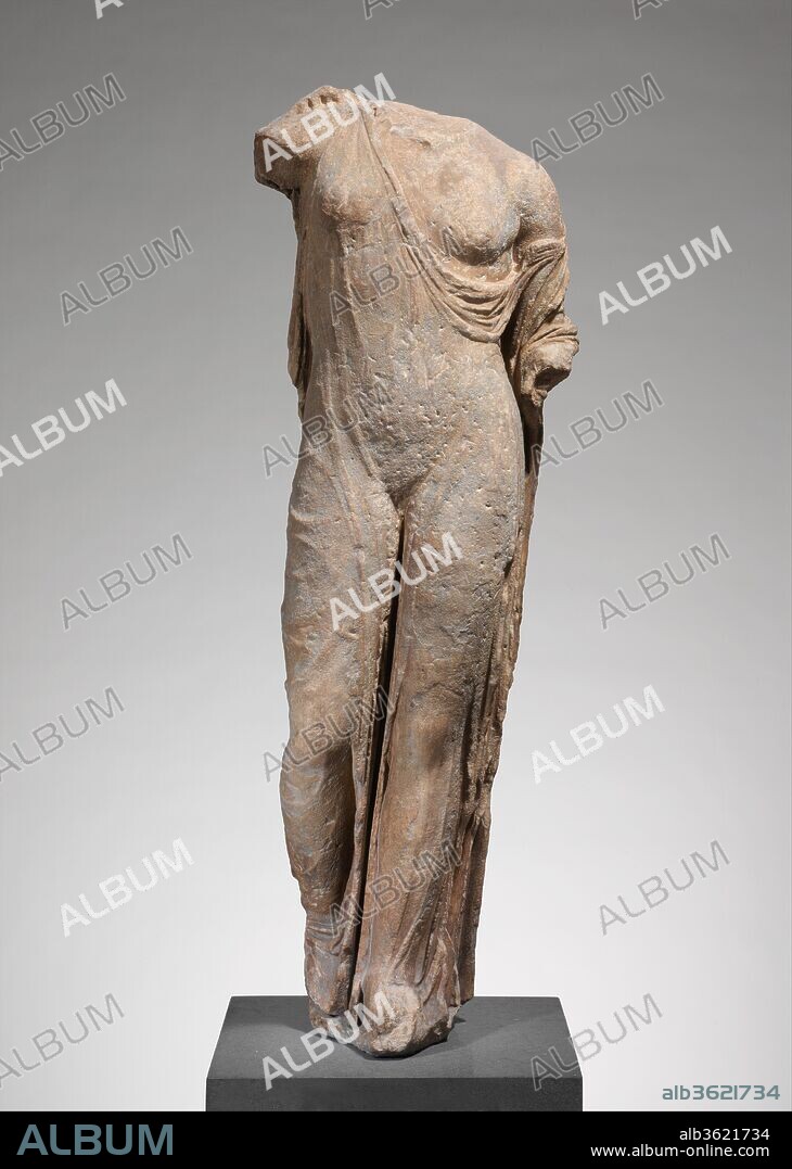Marble statue of Aphrodite, the so-called Venus Genetrix. Culture: Roman. Dimensions: H. 59 1/2 in. (151.1 cm). Date: 1st-2nd century A.D..
Copy of a Greek bronze statue of the late 5th century B.C. attributed to Kallimachos
This goddess wears a sleeveless, ungirt chiton of thin clinging material that reveals every curve of her body. Her pose--between standing and walking--was developed by the sculptor Polykleitos in the mid-fifth century B.C. She originally lifted one edge of her himation (cloak) with her right hand and probably held an apple in the other.