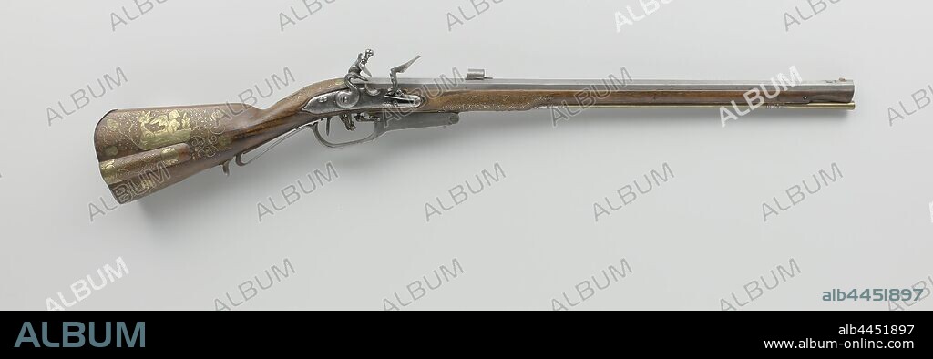 Flintlock hunting gun, Jaeger-type flint hunting rifle with extra hammer hammer mechanism and nineteenth-century adjustments. The lock is decorated with engraved leaves and chisel work, the lock plate has a signature. The barrel is entirely octagonal and becomes slightly wider towards the trumpet, drawn with six grooves, grain of brass, rear visor consisting of a plate and a tube visor, stamped on the bottom with a large brand IG K. The flask is simply cut and inlaid with curls of brass wire and iron decorative buttons, the handle has a cheek plate and a butt box, and is inlaid with engraved, brass figures. Apart from the two iron loading rod tubes, the fittings are brass and consist of a screw plate in the form of curls partially combined with the inlaid curl of the stock, a round thumb plate engraved with a grotesque face, and a flat stock plate, the loading stick is made of brass., Edvardt Abrahams de Moor, Utrecht, c. 1665, wood (plant material), brass (alloy), iron (metal), inlay (process), l 109.5 cm l 73.4 cm d 14.5 mm.