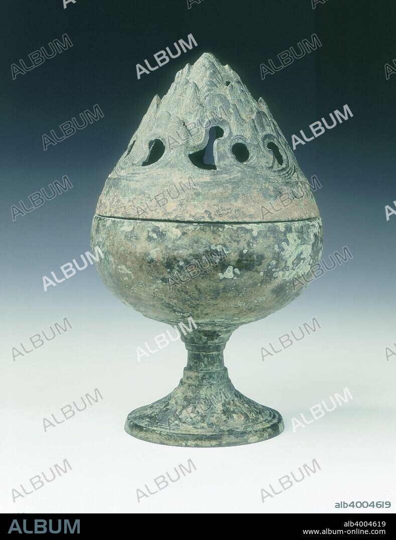 Bronze boshanlu censer, Wang-Mang Interregnum, China, 9-25. A boshanlu mountain censer, the cover of which is in the shape of a mountain representing Mount Penglai, the central mountain in the Daoist paradise. The bowl is plain. However, the lower part of the stand is extensively decorated with a stylised kui dragon pattern.