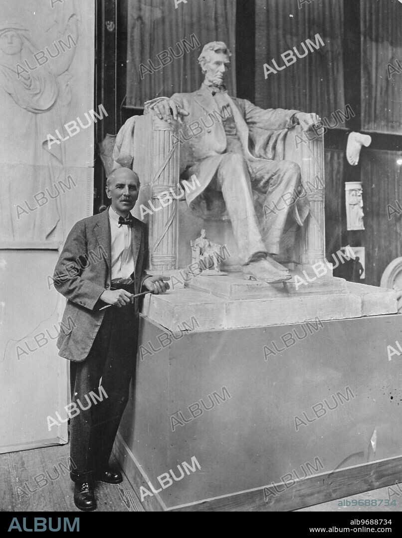 Sculptor and his most famous statue. Mr Daniel Chester French , America ' s foremost sculptor , with a model of his most famous statue , the the Lincoln memorial at Washington , D C . The models are being exhibited at the Stockbridge ( Mass ) Art Exhibition which opened on Saturday. 29 August 1925.