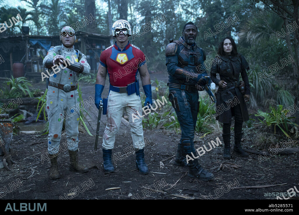 DANIELA MELCHIOR, DAVID DASTMALCHIAN, IDRIS ELBA and JOHN CENA in THE SUICIDE SQUAD (2021), directed by JAMES GUNN. Copyright DC Comics / Warner Bros..