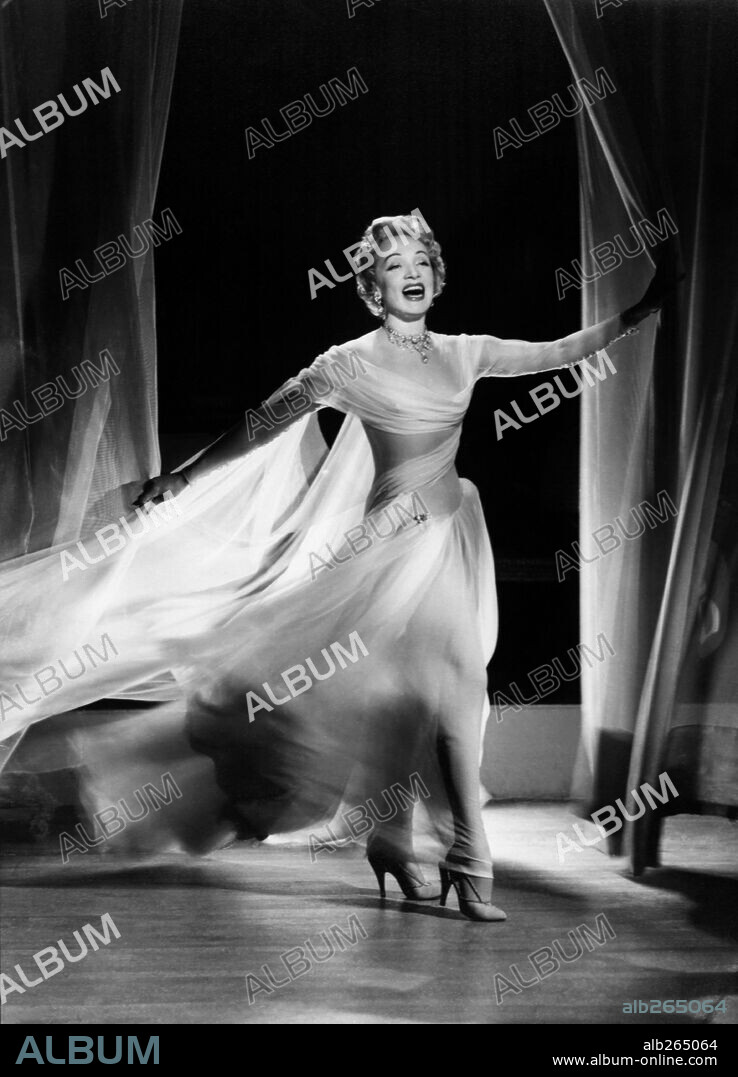 MARLENE DIETRICH in STAGE FRIGHT, 1950, directed by ALFRED HITCHCOCK. Copyright WARNER BROTHERS. Custome by Jean Louis.