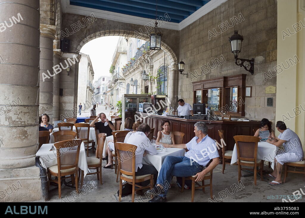 Outdoor cafe, El Patio in Plaza de la Catedral, Habana Vieja old town, UNESCO World Heritage Site, Havana, Cuba, West Indies, Caribbean, Central America.