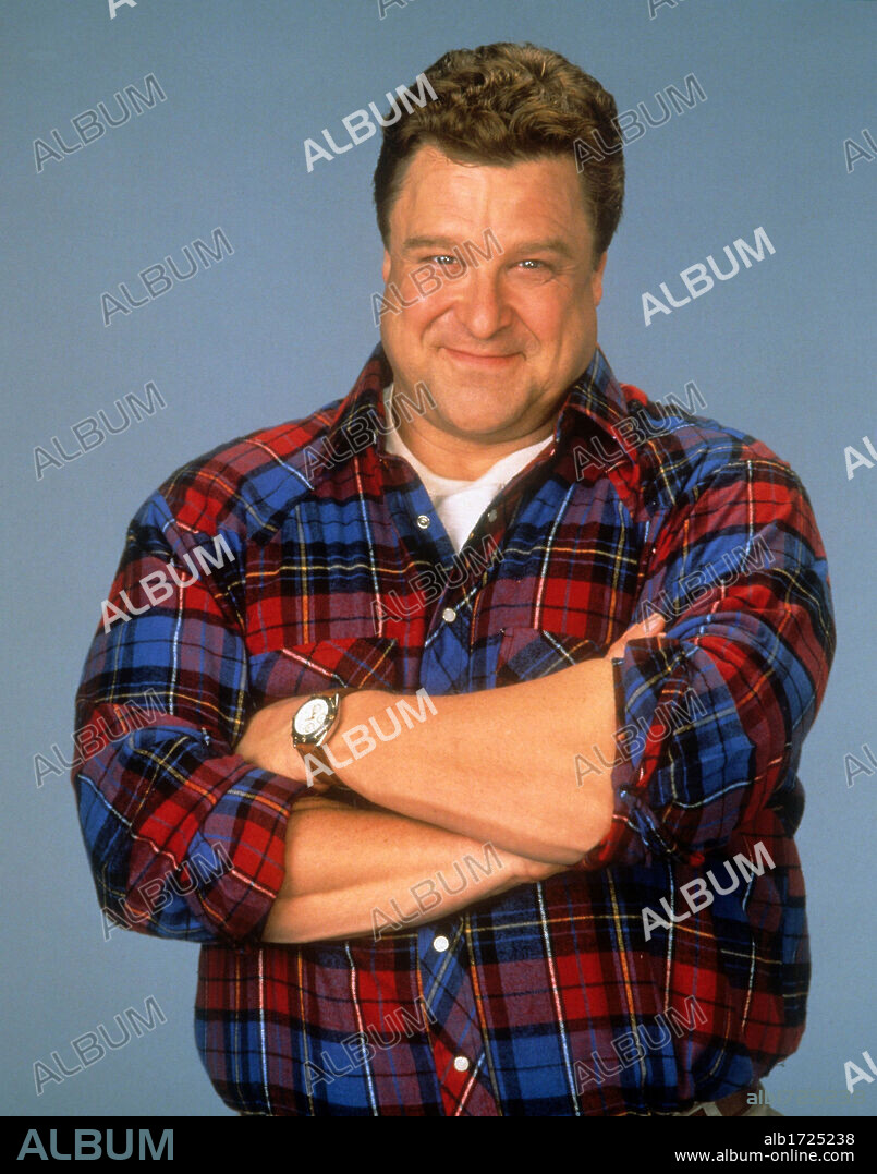 JOHN GOODMAN en ROSEANNE, 1988. Copyright CASEY-WERNER CO./WIND DANCER PROD.