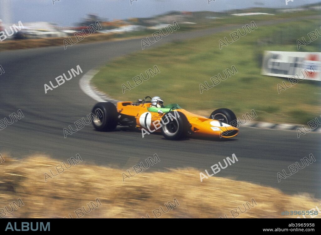 Denny Hulme, Dutch Grand Prix, Zandvoort, 1968. Hulme steers his McLaren through a corner. He retired from the race after 10 laps with ignition trouble. The New Zealander won eight races during his Grand Prix career, and was World Drivers' Champion in 1967, when he drove for Brabham.