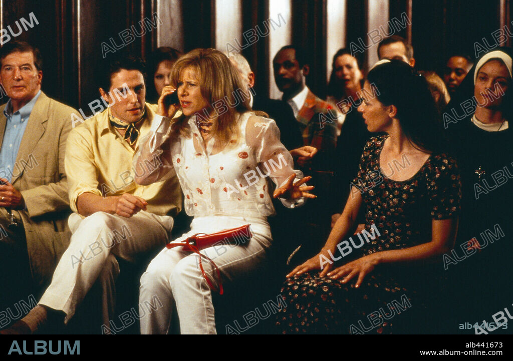 HUGH GRANT y TRACEY ULLMAN en GRANUJAS DE MEDIO PELO, 2000 (SMALL TIME CROOKS), dirigida por WOODY ALLEN. Copyright CLIFFORD, JOHN.